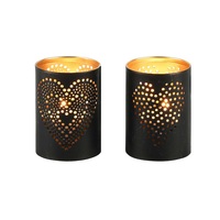 Porte-bougie en fer très demandé avec un motif magnifique pour bougies chauffe-plat, idéal pour les mariages, les fêtes et la décoration intérieure, à prix de gros