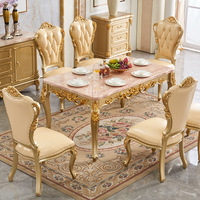Table et chaises de salle à manger de style européen, de la Cour Française, en bois sculpté de luxe, avec plateau en marbre artificiel, forme rectangulaire