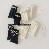Étiquettes personnalisées enfants chaussettes doux nœud papillon perle dentelle bas fille princesse vent Lolita tas chaussettes enfants genou haute chaussette