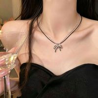 Nouveau Collier Sportif Femme 2026 en Acier Inoxydable avec Chaîne Bambou, Double Couche, Cordon Noir et Nœud Délicat Pailleté – Idéal pour Usage Quotidien