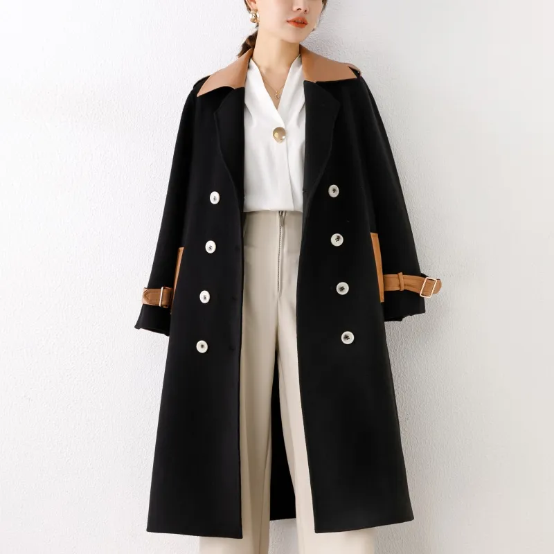 La última costura de cuero de abrigo negro de fabricación de moda al por mayor de la ropa de las mujeres
