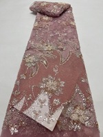Tissu en dentelle brodée de haute qualité avec des paillettes, des fleurs blanches et des perles pour vêtements féminins