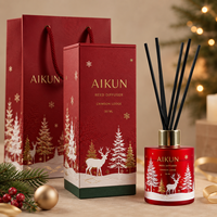 Coffret cadeau diffuseur à bâtonnets en verre parfumé Noël Aikun 2 bouteilles, avec bâtonnets en fibre noire dans une boîte imprimée pour offrir en fêtes
