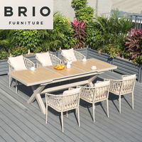 Ensemble de table et de chaises en bois plastique moderne pour l'extérieur, table extensible longue, imperméable, meubles de jardin en gros, directement de l'usine