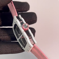 Montre-bracelet unisexe à quartz ultra-fine 9 mm, cadran squelette évidé léger, bracelet en nylon rose, style mode