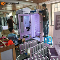 Distributeur automatique de bijoux et accessoires de beauté personnalisés avec écran tactile de 32 pouces, acceptant les paiements par carte de crédit et doté d'un système de levage