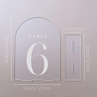 Numéros de table en forme d'arche givrés pour la décoration de table de réception de mariage