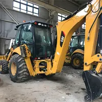 Used Cat 420F Backhoe Loader Caterpillar Tractor with Frontal Loader Bucket and Digging Bucket on the Rear Construction Backhoe