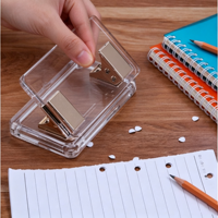 Perforatrice de bureau en acrylique transparent à 2 trous avec clip métallique doré pour carnets, classeurs et fournitures de bureau – Vente en gros usine