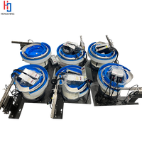 Alimentateur vibrant stable 220V pour assemblage de pièces automobiles avec moteur intégré, bol en acier inoxydable, vitesse de décharge 100 pièces/min, garantie 1 an
