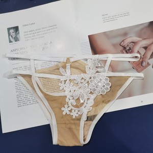 Culottes sexy européennes et américaines pour femmes, à fleurs, solubles dans l'eau, transparentes, lingerie séduisante. - Product Image 4