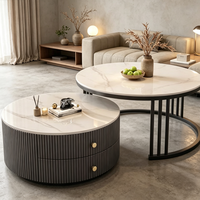 Table basse moderne noire à design rond avec rangement pour salon