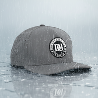 Casquette laser 5 panneaux à visière incurvée avec patch en caoutchouc et trous circulaires, très populaire