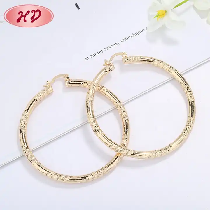 gold earrings - YouTube