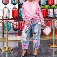 Nouvelle Arrivée 2025 – Usine Vérifiée – Jeans Déchirés à Imprimé Graphique Tendance – Fabricant de Jeans Streetwear en Gros