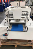 Machine de pliage de vêtements de t-shirt largement utilisée Machine d'ensachage et d'empilage automatique Chemise textile de bonne qualité