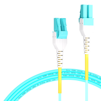 Kabel Patch Fiber 1m (3ft) 2 Fiber LC UPC Duplex ke LC UPC Duplex Switchable Clip Uniboot Multimode (OM3) Riser (OFNR) 2.0mm