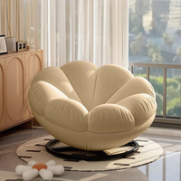 Fauteuil gris de style nordique, élégant, en forme de pétale, pivotant, avec coussin en peluche doux, pour la décoration moderne de la maison et du salon.