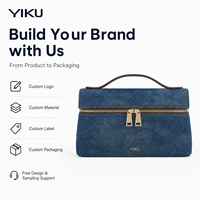 Tas Kosmetik Wanita YIKU Bahan Denim Kanvas Biru 100+ MOQ Logo Kustom OEM ODM 20 Tahun Pengalaman Pabrik Kapasitas Besar untuk Perjalanan
