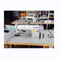 Machine à coudre industrielle à plat à point noué à aiguille unique Jukis 8700 utilisée au Japon
