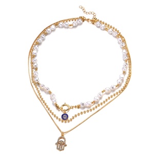 Collar de cadena de eslabones de <span class=keywords><strong>perlas</strong></span> doradas con colgante de aleación de imitación de <span class=keywords><strong>ojos</strong></span>, elegante y de nicho, para mujer, estilo vintage, para la clavícula. - Product Image 1