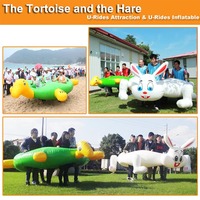 Jeux gonflables de construction d'équipe de course de lapin et de tortue de PVC pour des aires de jeu extérieures avec le ventilateur complémentaire