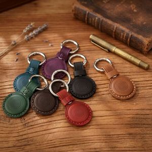 เคสหนังแท้สำหรับติดตามตำแหน่ง ใช้ได้กับอุปกรณ์ป้องกันการสูญหาย  ทำจากหนังวัว พร้อมพวงกุญแจป้องกันสัตว์เลี้ยงหาย - Product Image 2