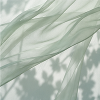 Tissu en mousseline recyclée 100 % polyester léger et transparent, tissu sergé à mémoire de forme, disponible en stock pour la production de vêtements en gros