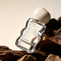 Flacon de parfum en verre avec logo personnalisé, 30 ml, 50 ml, flacon de parfum irrégulier avec pompe pulvérisatrice et boîte d'emballage pour les marques de parfum
