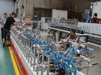Machine de stratification d'emballage de film de PVC à grande vitesse PUR pour le panneau de mur cannelé de profils de porte de fenêtre de PVC WPC