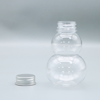 Les ventes directes d'usine peuvent personnaliser le logo 300ml Design créatif bouteille d'emballage de boisson en forme de gourde bouteille de jus avec couvercle