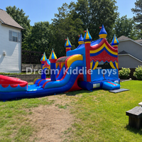 Château gonflable coloré de cirque avec double toboggan pour événements pour enfants, divertissement familial et locations pour fêtes