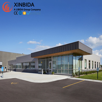 Entrepôt préfabriqué à grande portée avec structures en acier, cadre rigide Q355B et certifié CWB pour le stockage en vrac