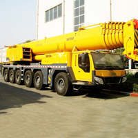 Grue sur camion QAY180 de 180 tonnes, flèche de 62 m, couple de levage maximal de 5420 KN-m, poids de transport de 60 000 kg, engin de construction