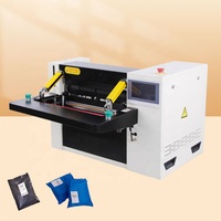 Machine d'emballage automatique DFD40TI avec imprimante code-barres industrielle, scellage et étiquetage automatiques pour sacs PE e-commerce et vêtements