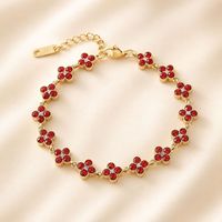Nouveauté transfrontalière : Bracelet trèfle à quatre feuilles, design élégant et avant-gardiste, entièrement pavé de zircons, haute qualité