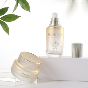 Ensemble de soins de la peau en verre dégradé or et perle de luxe, flacon pompe côtelé avec capuchon argenté 40ml-120ml et pot à crème <span class=keywords><strong>50g</strong></span>, vente en gros - Product Image 1