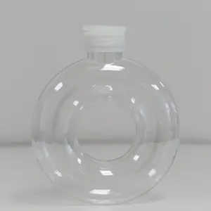 Hecho de material PET 500ml resistente al calor taza de té de la leche de mano Internet famosa botella de plástico de donut circular