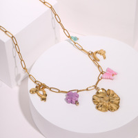 Collier pendentif fleur style français, plaqué or, en acier inoxydable, avec breloques étoile de mer et coquillage