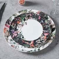 Vente en gros Assiettes en porcelaine osseuse avec imprimé animal Assiettes à dîner Assiette de service pour soirée à thèmes tropicaux