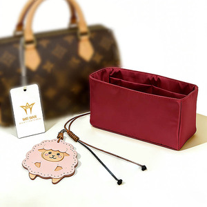 Kosmetiktasche Kosmetikorganizer aus Rindsleder und Satinstoff Kleine Damenhandtasche mit Anhängern Wasserdicht Umweltfreundlich Leichtgewichtig - Product Image 1