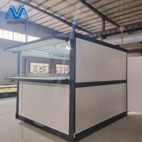Café conteneur préfabriqué extensible | Café modulaire avec portes en verre et éclairage moderne