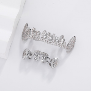 กริลล์ซสำหรับฟัน รูปดาวแบบไม่สมมาตร ดีไซน์ทรงหยดน้ำ สีเงิน สีทอง ชุดเซ็ตแบบฝังเพชร สำหรับทุกเพศ ใส่ได้ทุกวัน สไตล์ฮิปฮอป ทันสมัย - Product Image 2