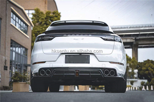 วัสดุคาร์บอนไฟเบอร์ยี่ห้อ Runde สำหรับอัพเกรดรถ Porsche Cayenne ชุดแต่งสไตล์ CMST ประกอบด้วยลิ้นหน้า สเกิร์ตข้าง คิ้วล้อ สปอยเลอร์หลัง - Product Image 3