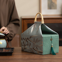Sac cadeau de luxe en satin brodé de bambou avec poignée et pompon pour l'emballage de cadeaux du Ramadan et du Nouvel An chinois