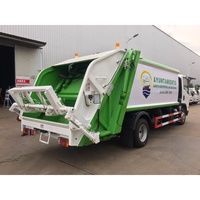 Camion à ordures compacteur à chargement arrière ISUZU ELF 12CBM 4x2 Diesel