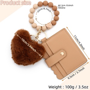 Porte-clés 2026 en cuir PU avec breloque peluche douce en forme de boule de poils, fermoir mousqueton et porte-cartes pour femme - Product Image 6