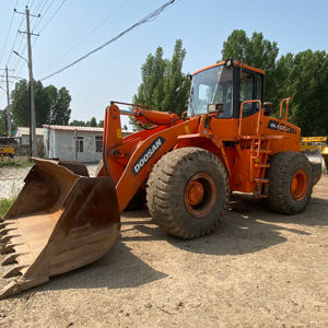 รถตักล้อยาง Doosan รุ่น Dl503 สภาพดี ใช้งานได้ รถตักหน้า Doosan เครื่องจักร Doosan มือสอง - Product Image 1