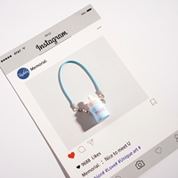 Nouveau mignon dessin animé Mini bébé bouteille porte-clés pendentif sac décoration petit cadeau voiture sac à dos Xiaohongshu