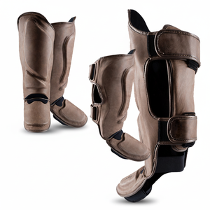 Espinilleras de cuero con logotipo personalizado de alta calidad MMA Boxing Shin Protector Muay Thai Shin Guard para adultos Protección funcional - Product Image 1